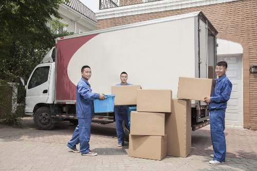 Man with a van service loading items for transport