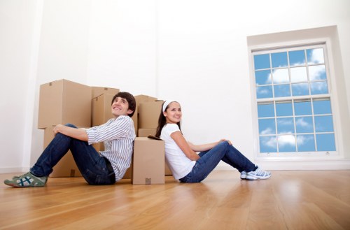 Unpacking household items into a new home in Wood Green