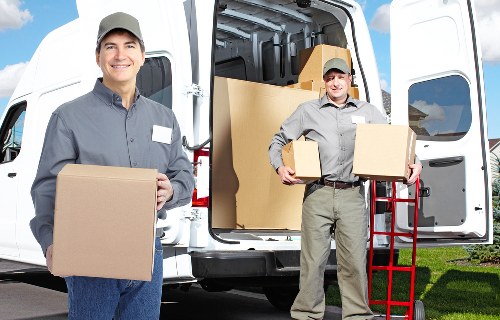 Packed office equipment ready for transport in North London