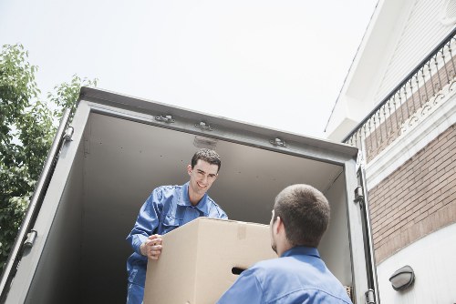 Packed office boxes and furniture ready for relocation