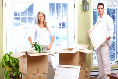 Woodgreen moving service loading furniture into a van